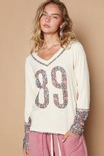 Butter Milk V-Neck Long Sleeve Floral Print Number Patch Top