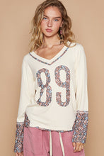 Butter Milk V-Neck Long Sleeve Floral Print Number Patch Top